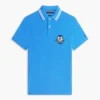 Vestibilità regolare Polo in piqué con stemma monogramma Vestibilità regolare Polo in piqué con stemma monogramma
